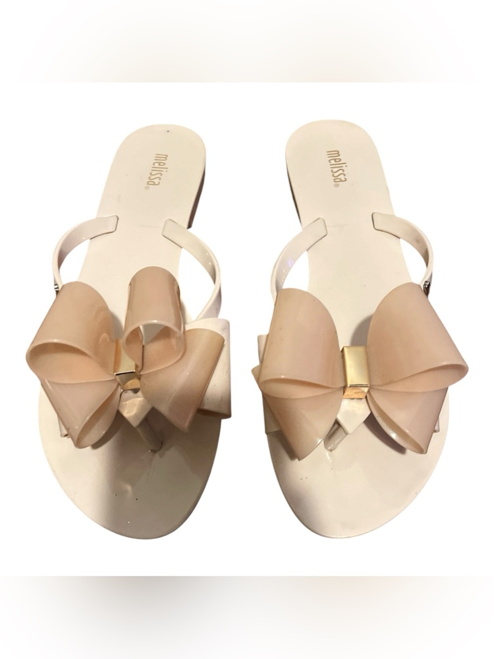Mel by Melissa Women's harmonic, bow jelly flip flops in blush